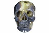 Polished Blue Agate Skull With Quartz Crystal Pocket #127601-1
